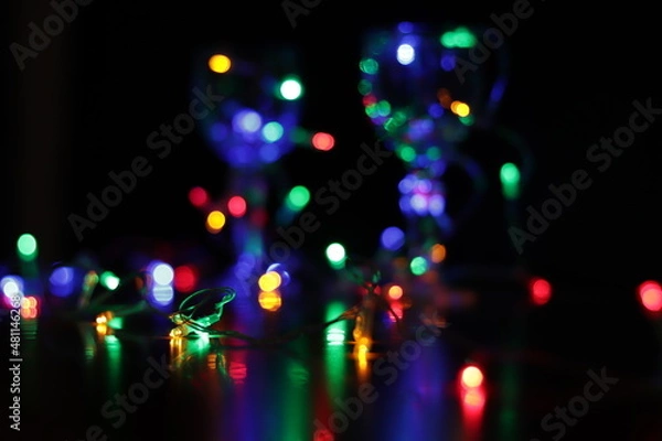 Obraz colored bokeh on a black background