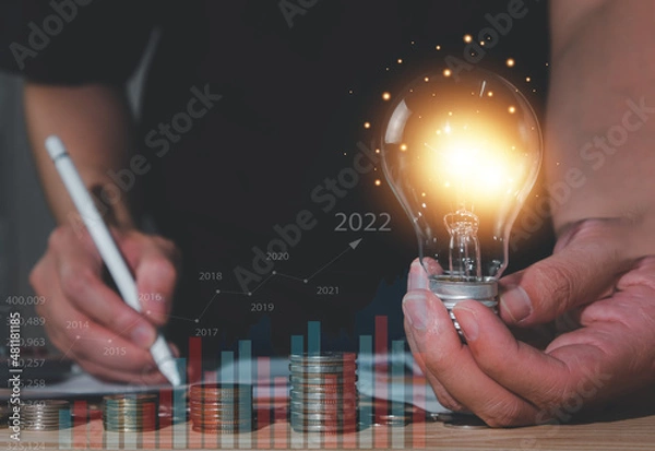 Fototapeta Concept of stock market investments and digital assets, financial technology, 2022, business year.., business and financial data analysis.