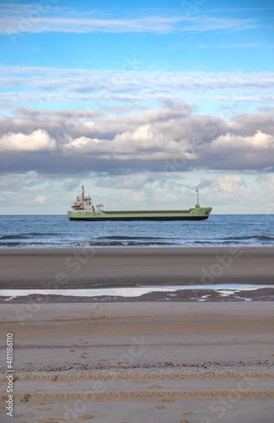 Obraz Huge ship passing the beach
