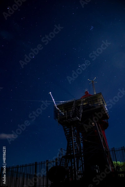 Obraz Starry night at old lighthouse