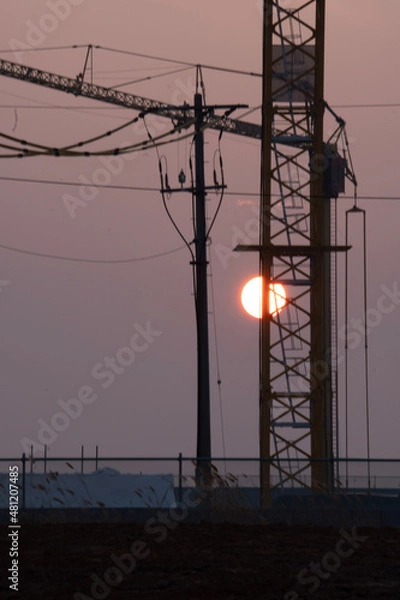 Obraz power lines at sunset