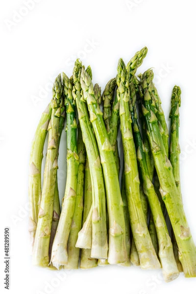 Fototapeta Group of raw green asparagus isolated on white background.