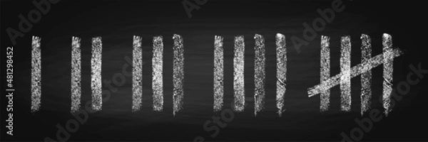 Fototapeta Tally marks count Chalk on a Black chalkboard wall sticks lines counter.