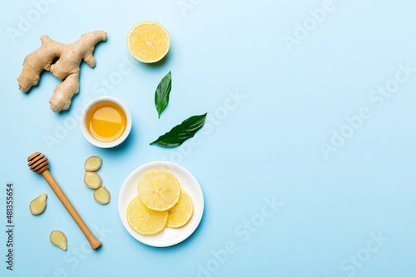 Fototapeta Natural cold and flu home remedies. Natural ingredients for immunity stimulation and viruses protection. top view flat lay