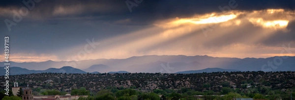 Obraz This beautiful sunset landscape view in Santa Fe New Mexico ephasizes the layers of light in the mountaiins surrounding this city different.