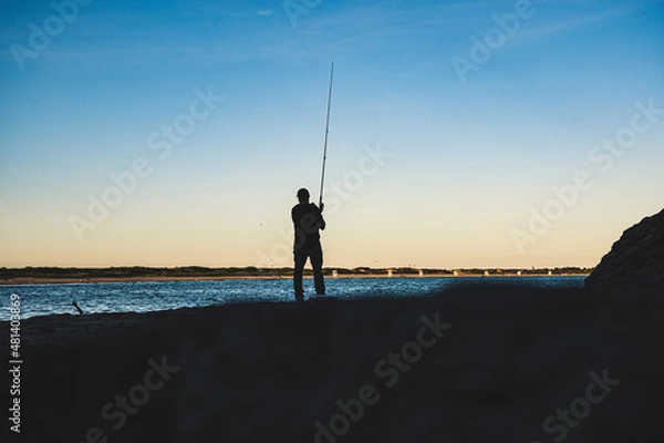 Fototapeta Fisherman casting at Second Beach, Rhode ISland