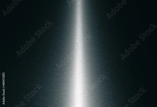 Fototapeta Texture of brushed metal surface. Abstract background of light shining on steel plate.