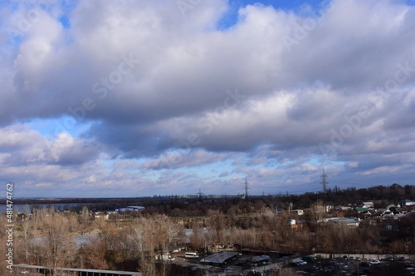 Fototapeta clouds over the river