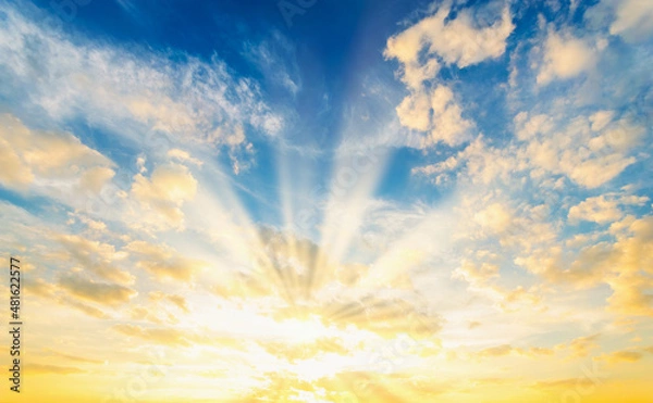 Obraz Sky blue and orange light of the sun through the clouds in the sky