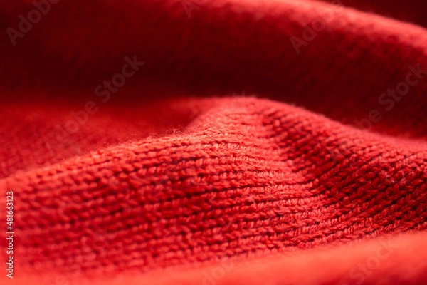 Fototapeta closeup red knitted woolen fabric texture background