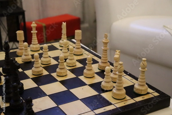 Fototapeta lets play chess on table