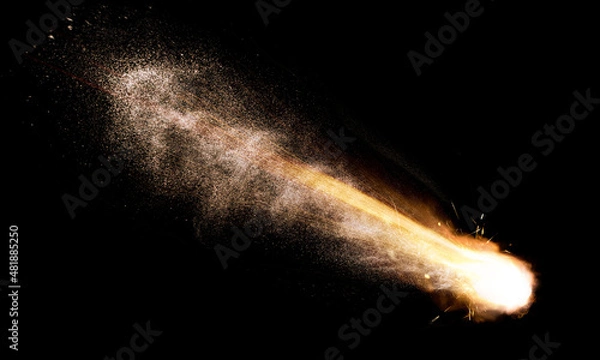 Obraz texture of a falling comet with sparks, smoke and a trail of particles, isolated on a black background