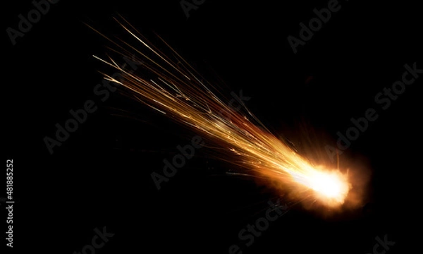 Obraz texture of a falling comet with sparks, smoke and a trail of particles, isolated on a black background