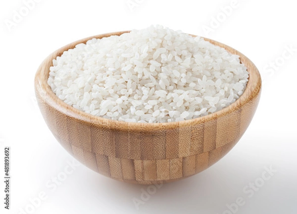 Fototapeta Uncooked round rice in wooden bowl isolated on white background with clipping path