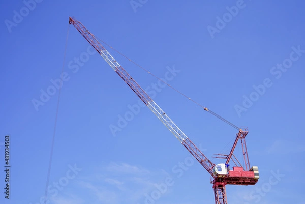 Obraz construction crane against bright sky background