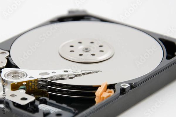 Fototapeta close up of hard disk plate and reader head