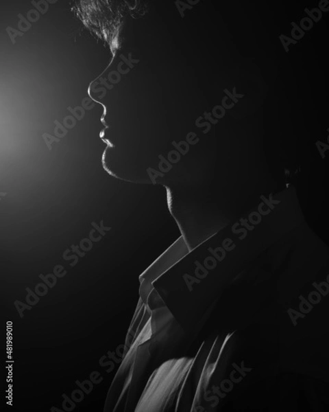Obraz Profile back-light man portrait in white shirt in black and white