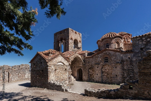 Fototapeta Ancient Greek Orthodox monastery ruins with stone walls, church and other buildings, Mystras, Greece