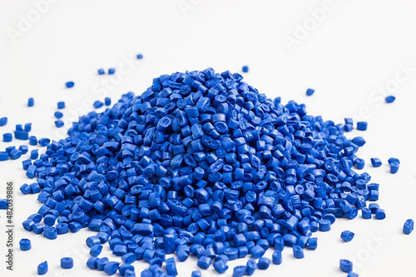 Fototapeta blue granules of polypropylene, polyamide. White background. Plastic and polymer industry. Microplastic products.	