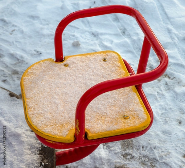 Obraz benches on the playground are covered with snow