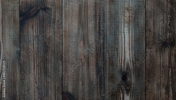 Fototapeta old boards from fences and gates are covered with dirt and old paint