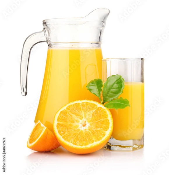 Fototapeta Jug, glass of orange juice and orange fruits with green leaves i