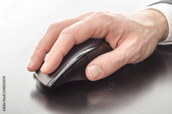 Fototapeta Using a computer mouse