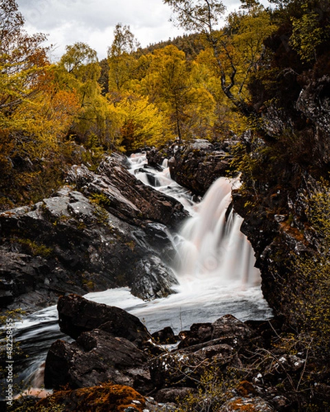 Fototapeta Scenic Waterfall in an Scotland Autumn Forest