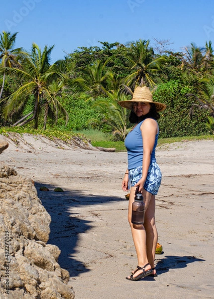 Obraz person walking on the beach
