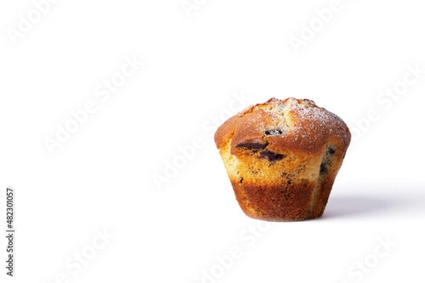 Fototapeta Vertical photo of an isolated muffin with chocolate and berries without paper. Front view.
