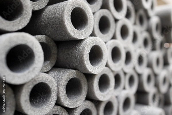 Fototapeta polyethylene foam pipe insulation background . soft focus