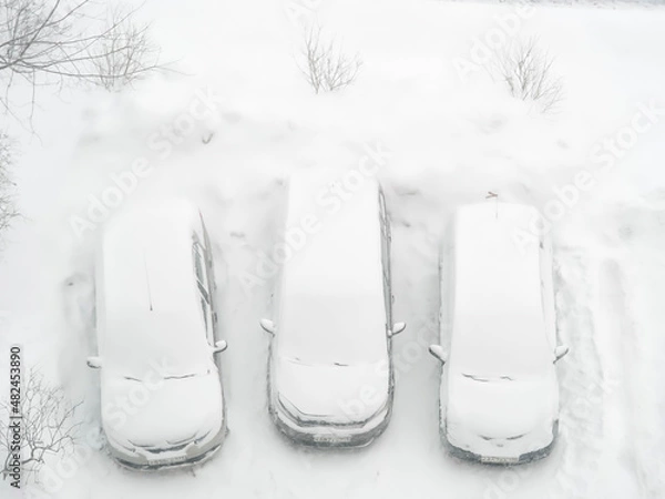 Fototapeta Cars under freshly fallen snow