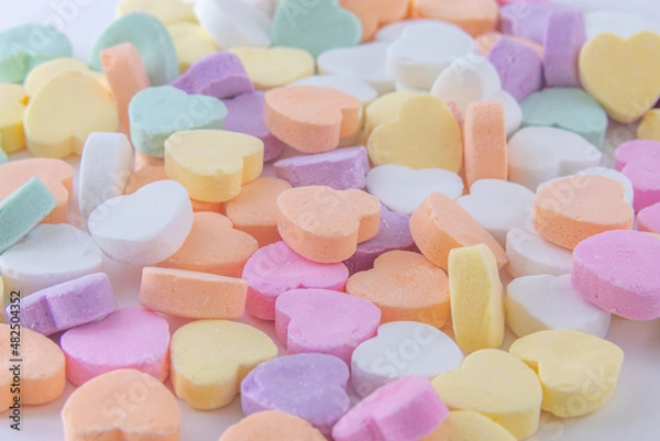 Obraz Conversation hearts on white background flat lay.