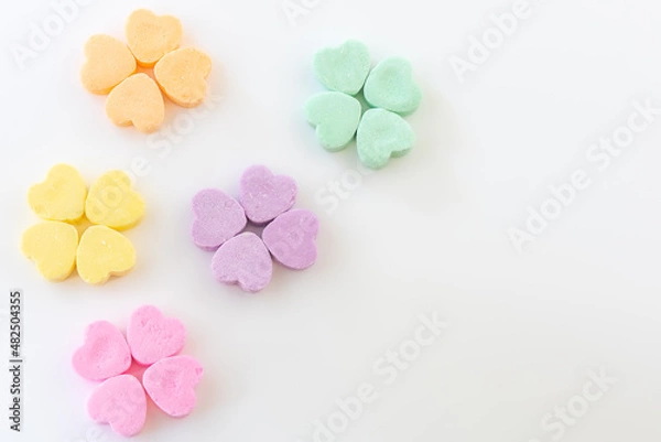 Obraz Conversation hearts on white background flat lay.