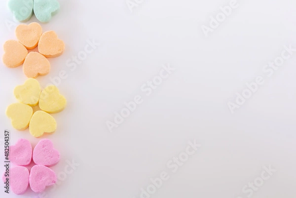 Obraz Conversation hearts on white background flat lay.