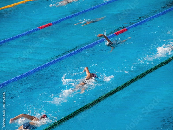Obraz People exercising in a swimming pool