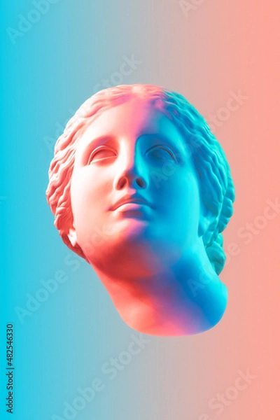 Fototapeta Gypsum copy of the ancient statue of Venus de Milo in pastel tone for artists on pink blue background. Plaster sculpture of a woman's face. Art modern poster in soft colors. Love, beauty, feminism.