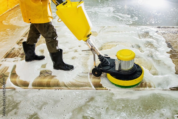 Fototapeta Long carpet chemical cleaning with professionally disk machine. Regular clean up.