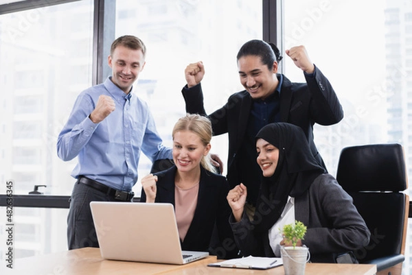 Obraz Group of office workers are successful working.