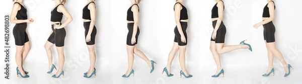 Obraz A woman's body in black leggings on a white background in different poses. Attractive feet in shoes.