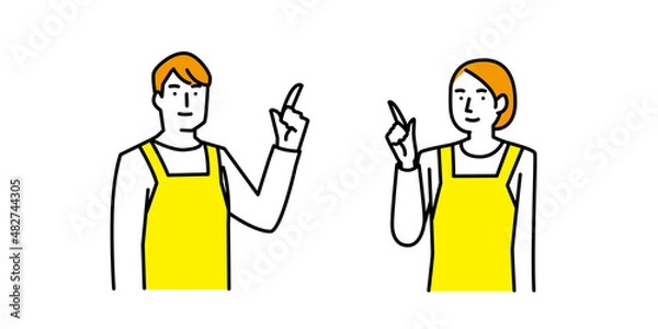 Obraz 上を指差し案内をするエプロン姿の男性と女性