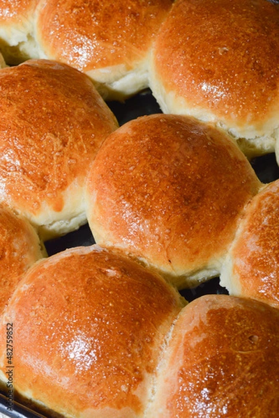 Obraz The process of making fresh round-shaped yeast buns.
