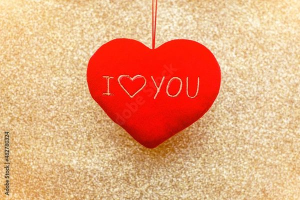 Obraz Heart symbol on a gold shiny background