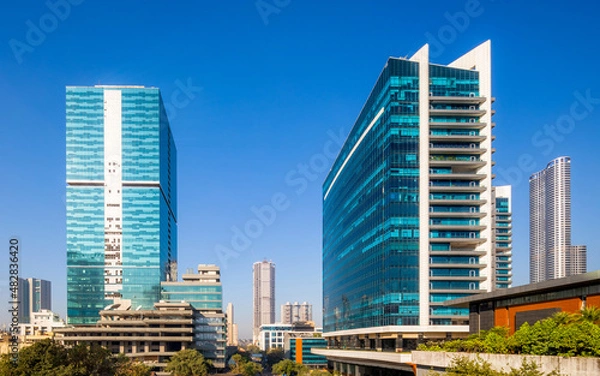 Fototapeta The view of the business and skyscraper precinct of Lower Parel, Mumbai that greets you as you enter the precinct by taking the Lower Parel bridge (currently closed for reconstruction).