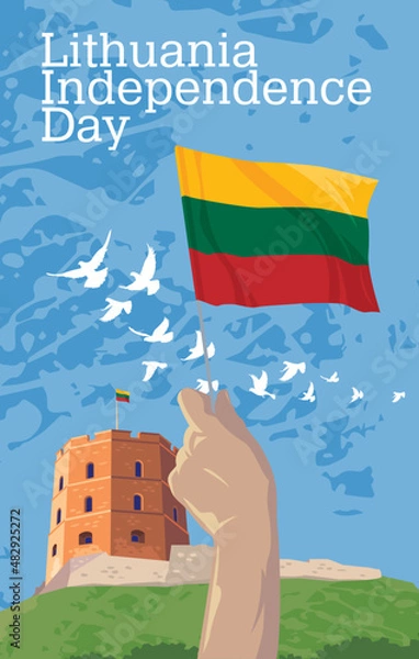 Fototapeta Hand with the national flag Lithuania on the background of the Gediminas Tower. Happy Independence Day.