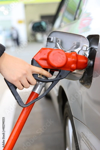 Fototapeta Refueling car tank