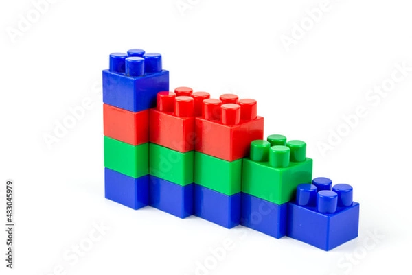 Obraz colorful wall-built building blocks isolated on white background. close-up