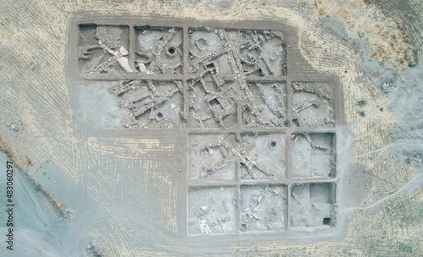 Fototapeta Excavations in the area of ​​the ancient city. archaeological excavation background. historical. top view. Arhaeological site. ancient city 