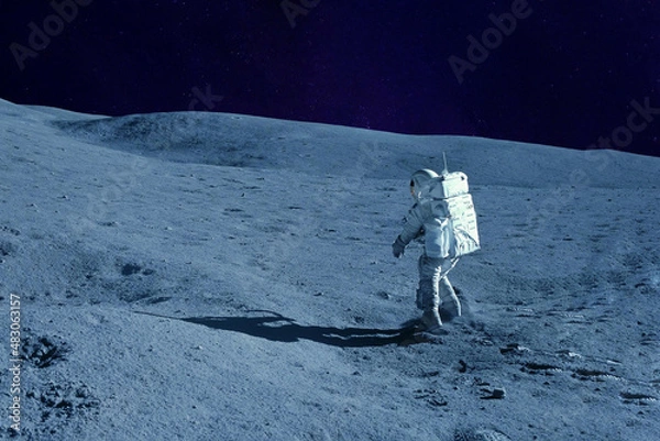 Fototapeta Astronaut on the moon, with galactic background. Elements of this image were furnished by NASA.
