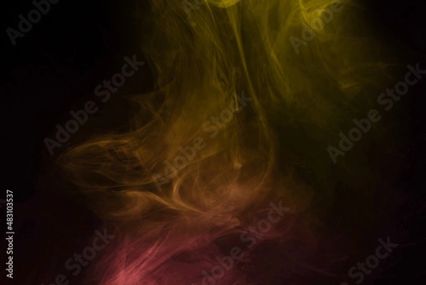 Obraz Yellow and pink steam on a black background.